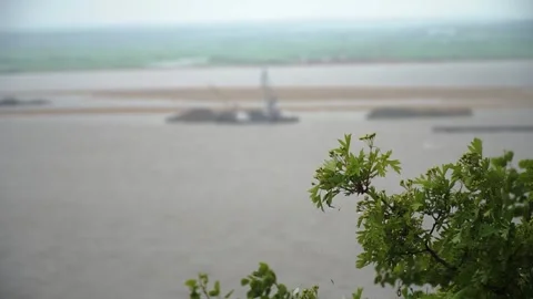 Top Down view of Amur River. Trees and rock mountains Stock Footage 315425110