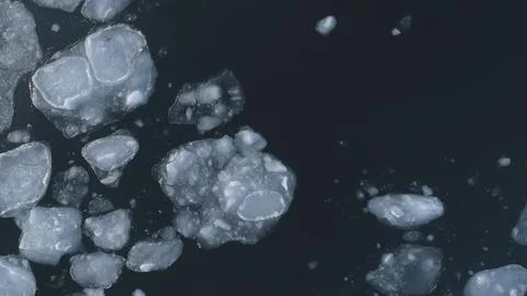 Top Down View Antarctic Drone Flight Over Float Ice Ocean. Stock Photos