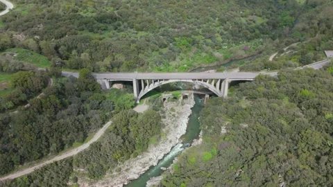 Top Down View of Arch Bridge Over River in Peloponnese Stock Footage 337087221