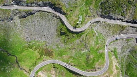 Top Down View Of Balea Lake And The Famous Transfagarasan Mountain Road In Video stock 233887814