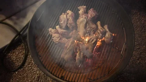 Top down view of Barbecue chicken on a small BBQ Stock Footage 135706984