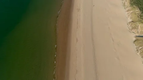 Top-down view of a beach in the Netherlands. 스톡 동영상 275349028