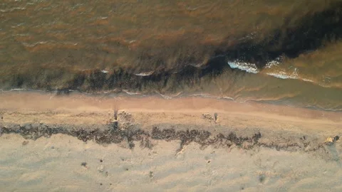 Top down view of the beach. Summer 2024 writing on the sand. Top down view Stock Footage 276945625