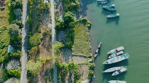 Top Down View of Beautiful Lake With Fishing Boats Stock Footage 209178382