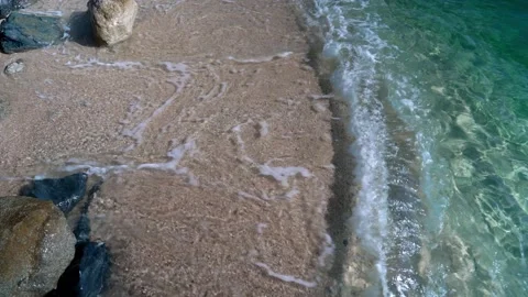 Top down view of beautiful pristine Sea Water. Sandy beach and clear water Stock Footage 197439030