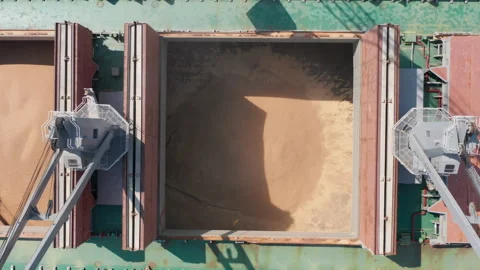 Top down view Black Sea port Loading of dry cargo ship by grain cranes. Stock Footage 237828980