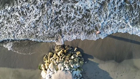 Top down view of blue ocean waves and golden sand beach aerial drone, Aerial Stock Footage 327085063