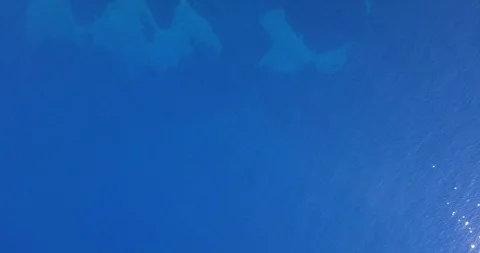 Top down view of blue water and sun reflections Stock Footage 93395913