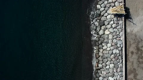 Top down view on boats on black sand beach Stock Footage 159639612