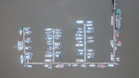 Top Down View of Boats Moored in Organized Harbor Slips Stock Photos