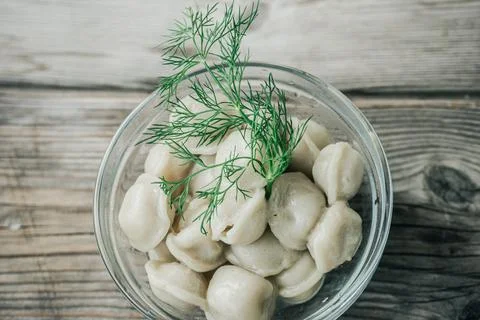 Top-down view of boiled dumplings served in a clear glass. Stock Photos