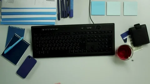 Top down view. A bored guy is fooling at his working place Stock Footage 79967428