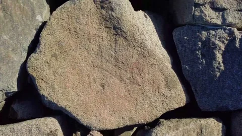 Top Down View of Breakwater Rocks Texture and random Pattern Vídeo Stock 332479496