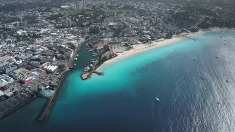 Top down view of Bridgetown, Barbados with house and Constitution River Vídeo Stock 136386341