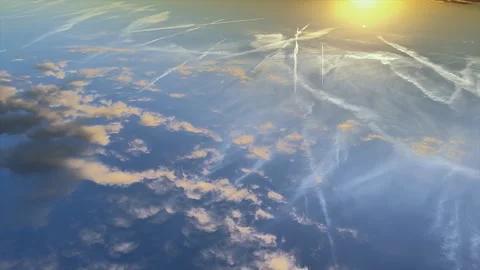 Top Down View of Bright Sun Near Horizon in Blue Sky Time Lapse Video stock 347577183