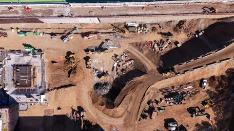 Top Down View of Bulldozer on Construction Site with Dirt Road and Machinery Vídeo Stock 312652463