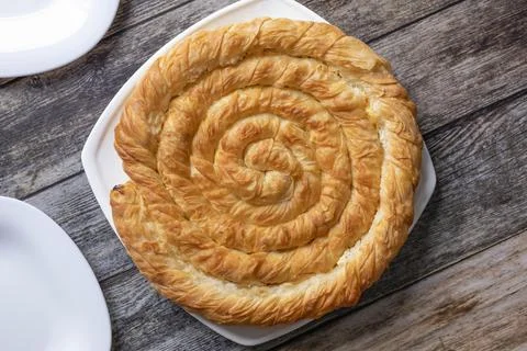 Top down view of Burek Pie served on a table Stock Photos