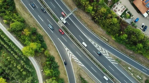 Top-down view of busy traffic flow at a highway. Stock Footage 95583374