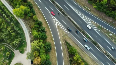 Top-down view of busy traffic flow at a highway. Stock Footage 95583403