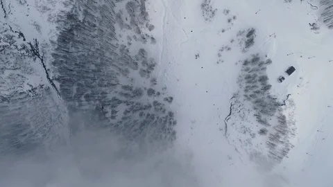 Top down view the cable car goes under the clouds Video stock 103474840