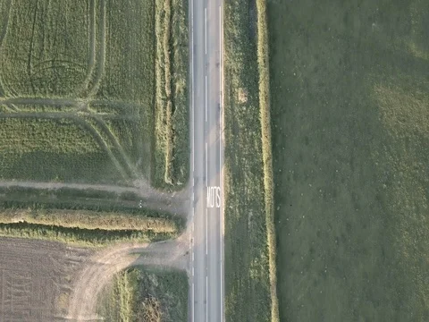 Top down view of car driving through countryside Stock Footage 79253073