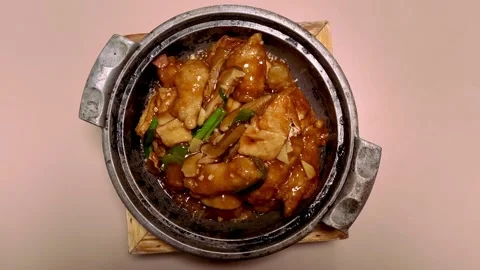 Top down view of chinese sapo tofu with assorted fish and seafood in a hot pot Video stock 318267681