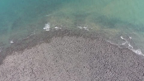 Top Down View of Clear Blue Water on Lynmouth Beach in North Devon. Stock Footage 341673085