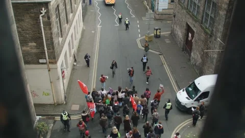 Top Down View Of Climate Protestors Walking Out From Under A Bridge Vídeo Stock 164548712