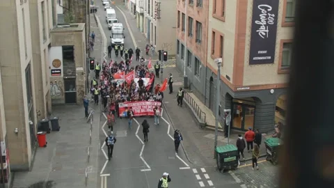 Top Down View Of Climate Strikers Walking Down Road Stock Footage 164548530