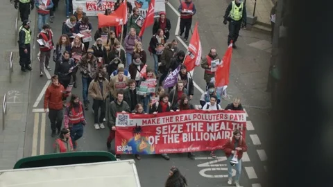 Top Down View Of Climate Strikers Walking Down Road Stock Footage 164548682