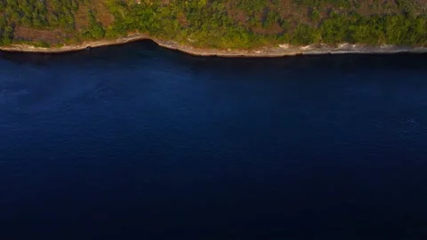 Top down view on coast in Bali on sunset Stock Footage 160036918
