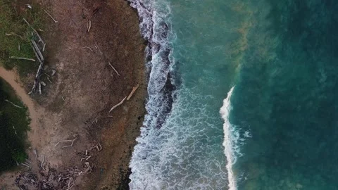 A top-down view of the coastline during a mild storm Stock Footage 305859675
