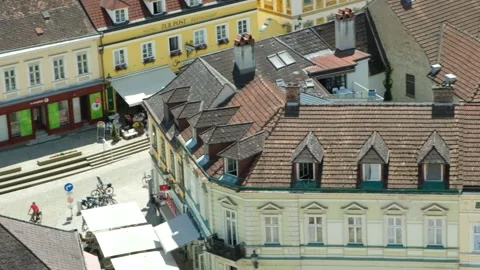 Top down view of colorful historic buildings and rooftops in Melk old town. July Stock Footage 339621533