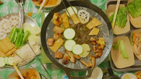Top-down view of communal grill meal. Stock Footage 328617322