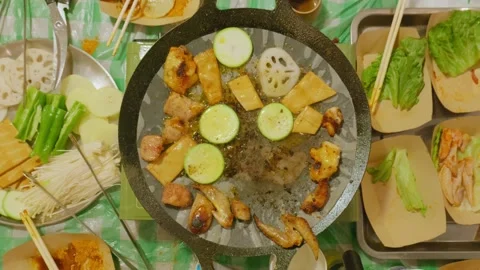 Top-down view of communal grill meal. Stock Footage 328617414