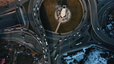 Top down view of a complex roundabout road intersection with a column in the Stock Footage 236620002