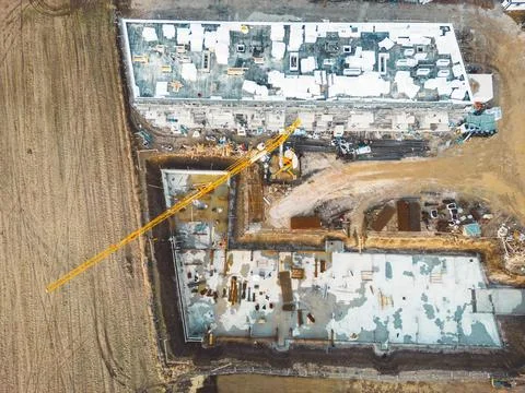Top down view construction site of two residential buildings in progress Stock Photos
