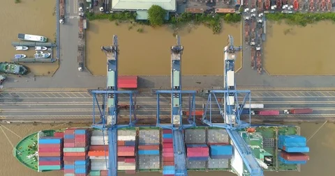 A top-down view of container ship at a dock with container terminal in Vietnam. Stock Footage 124491558