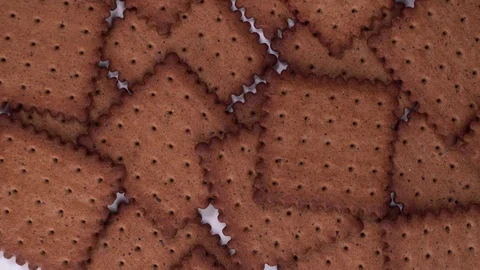 Top down view cracker rotate or spin on the table. Sweet cookies lay on table. Stock Footage 124283689