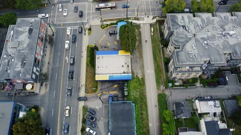 Top down view of crossroad with white and black cars in Canada Stock Footage 141136157