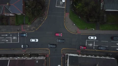 Top Down View of Crossroads Junction on Uk Roads With Busy Traffic Stock Footage 183591259