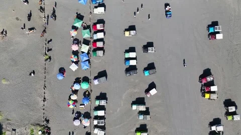 Top down view of crowded jeep cars on the Mount Bromo desert in East Java 스톡 동영상 329368134