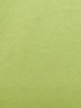 Top-down view of crumpled dark green fabric texture with soft natural shadow Stock Photos