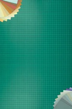 Top down view of cutting mat with colour swatches placed in opposite corners Fotos de archivo