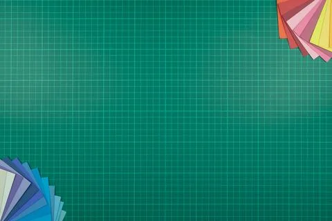 Top down view of cutting mat with colour swatches placed in opposite corners Stock Photos