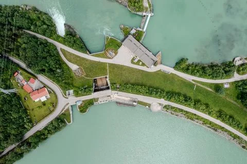 Top Down View of Dam Between Two Turquoise Water Basins Stock Photos