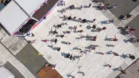 Top-down view of dancing people. A fun holiday. A lot of young cheerful people 動画素材 172312749