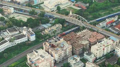 Top down view of The Delhi Rail running on the tracks towards the Station. Stock Footage 317821903