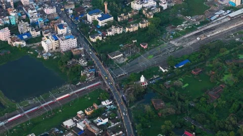 Top down view of The Delhi Rail running on the tracks towards the Station. Stock Footage 317940011