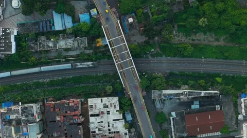 Top down view of The Delhi Rail running on the tracks towards the Station. Stock Footage 317940050